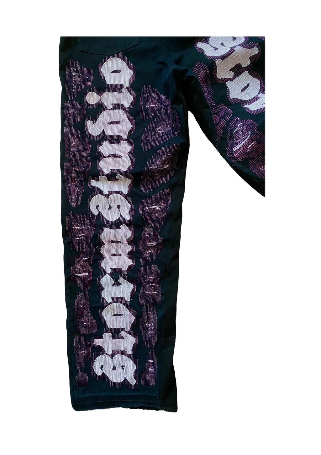 Black and pink repaired logo Jeans