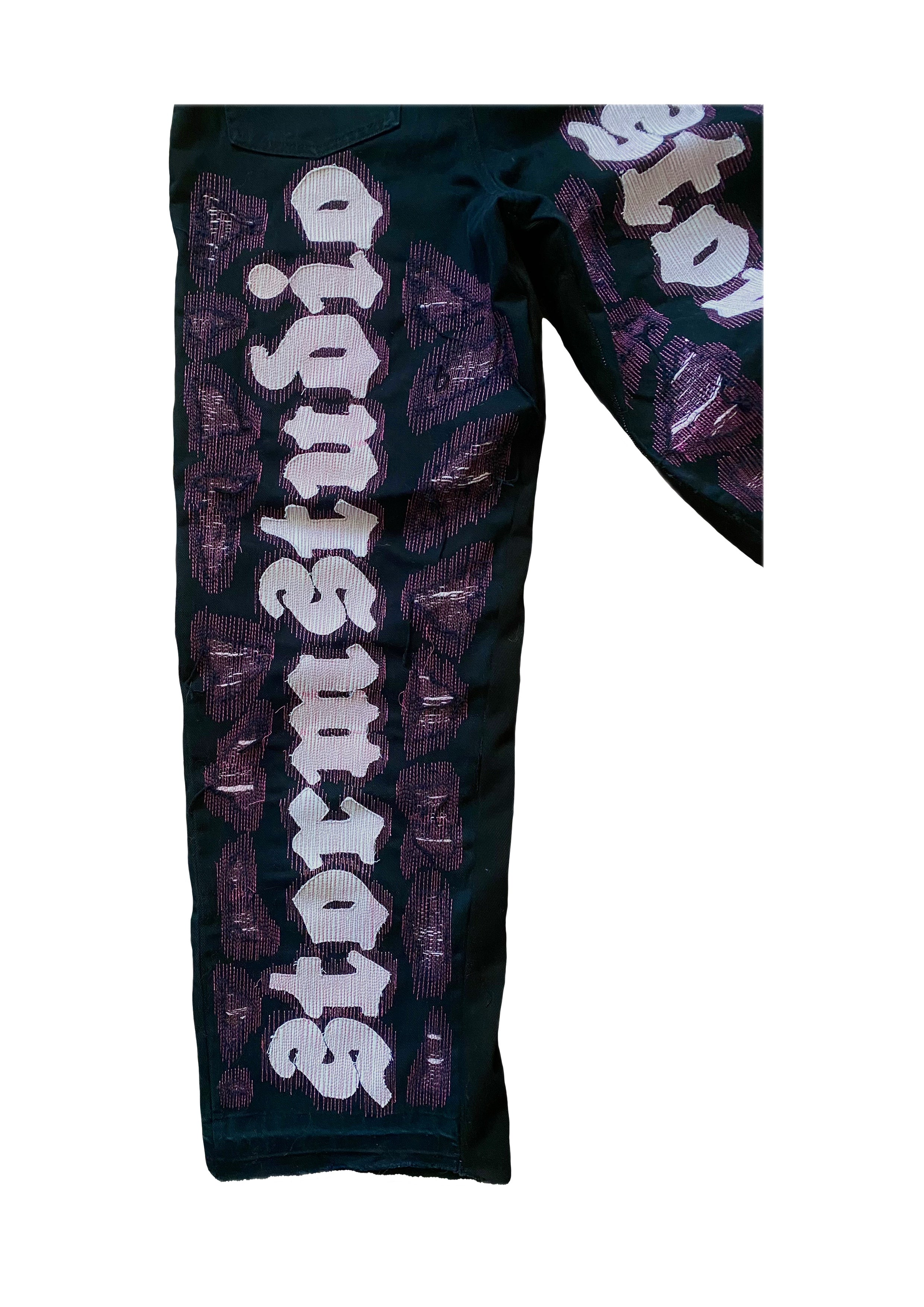 Black and pink repaired logo Jeans
