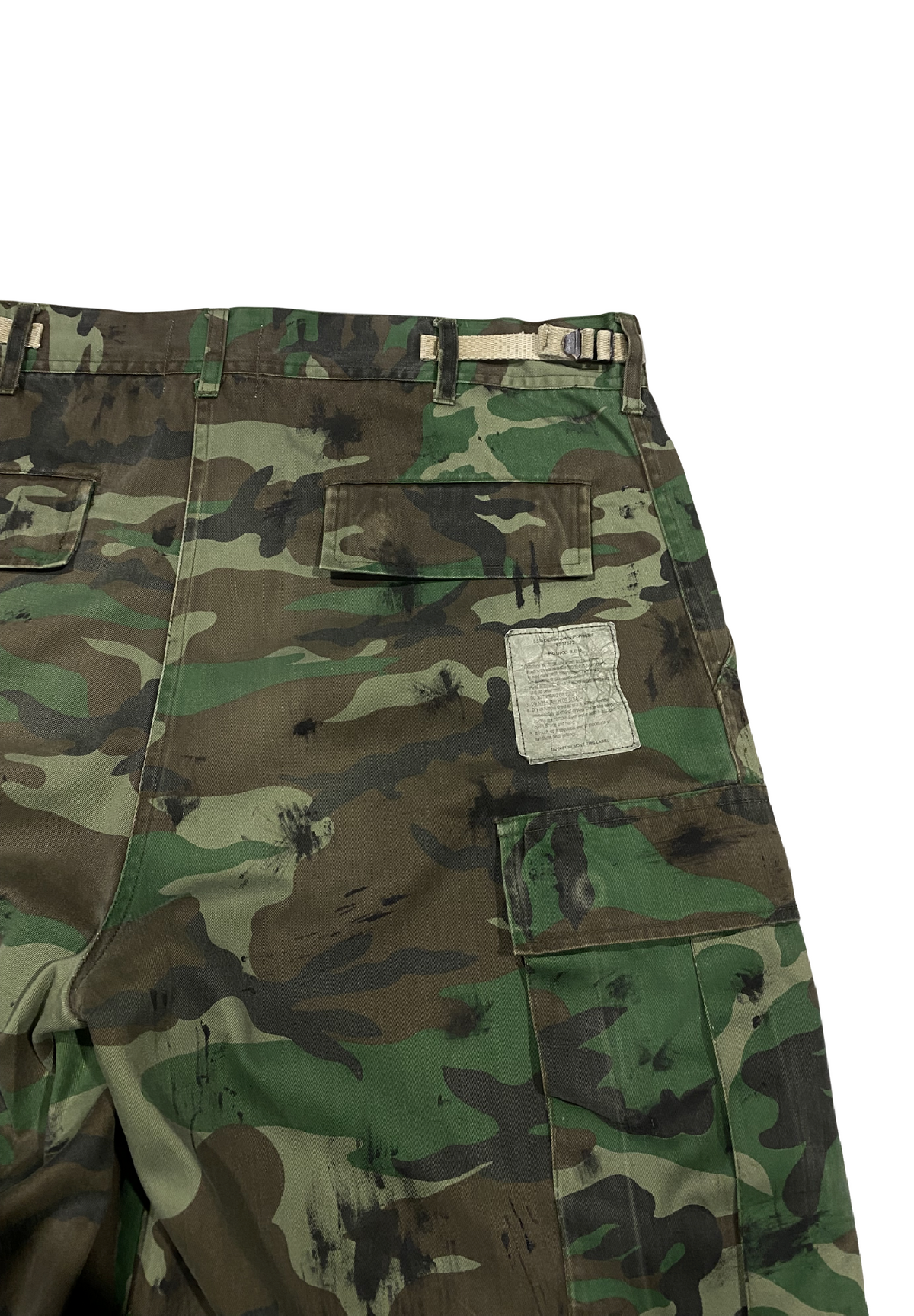 Battle-scarred Woodland camo shorts